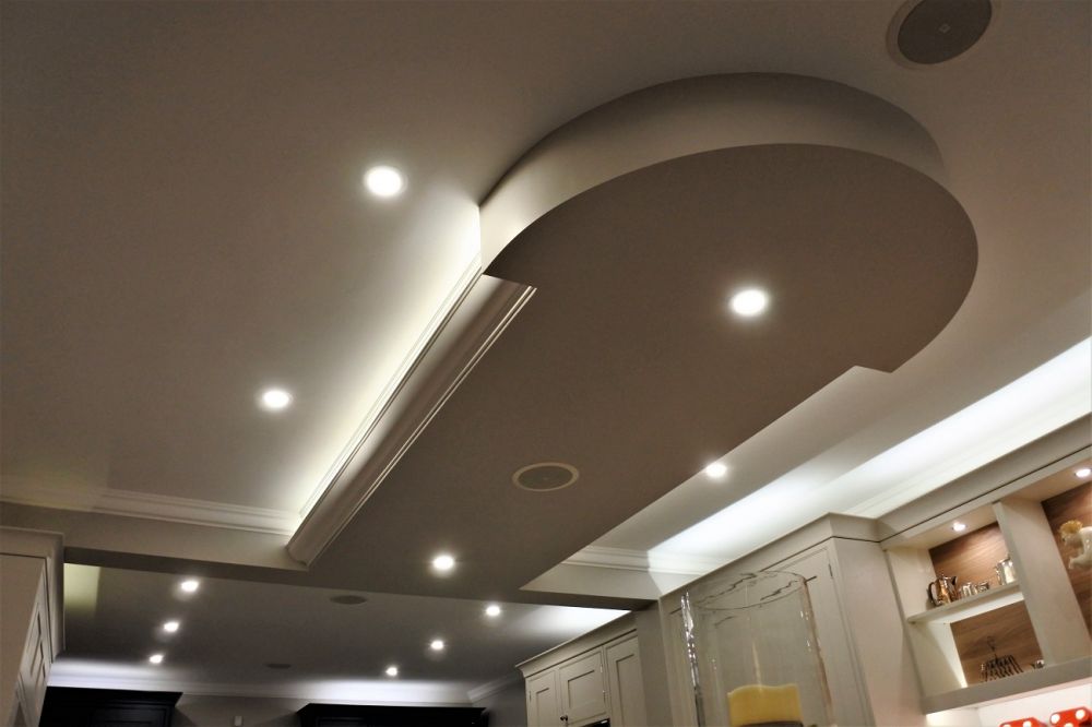 Ceiling detail following island shape below