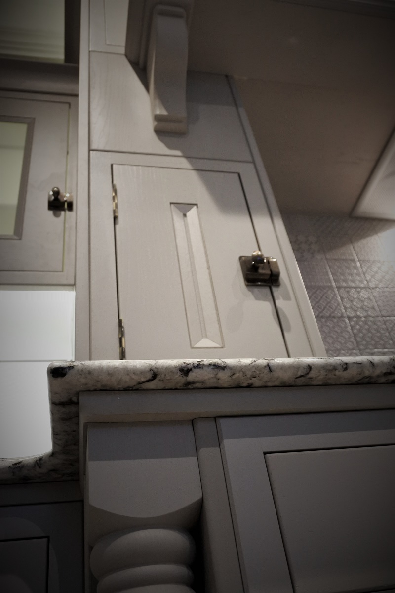 Newal Post, Roman Edge Ice Blue granite, Cabinet latch, Hinge and Corbal all in one photo