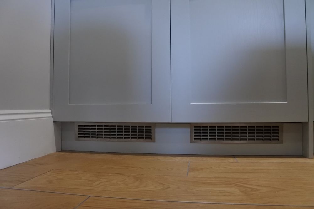 Refrigerator Vents allowing compressor cooling