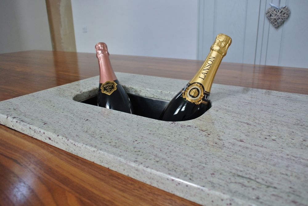 Ice sink on full stave Walnut island...You can do wonders with Granite