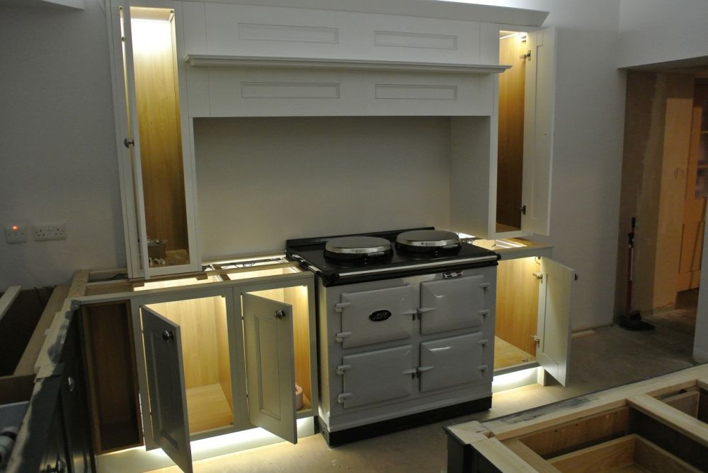 Internal LED lighting. When you open that particular kitchen door the motion sensor activated internal lighting