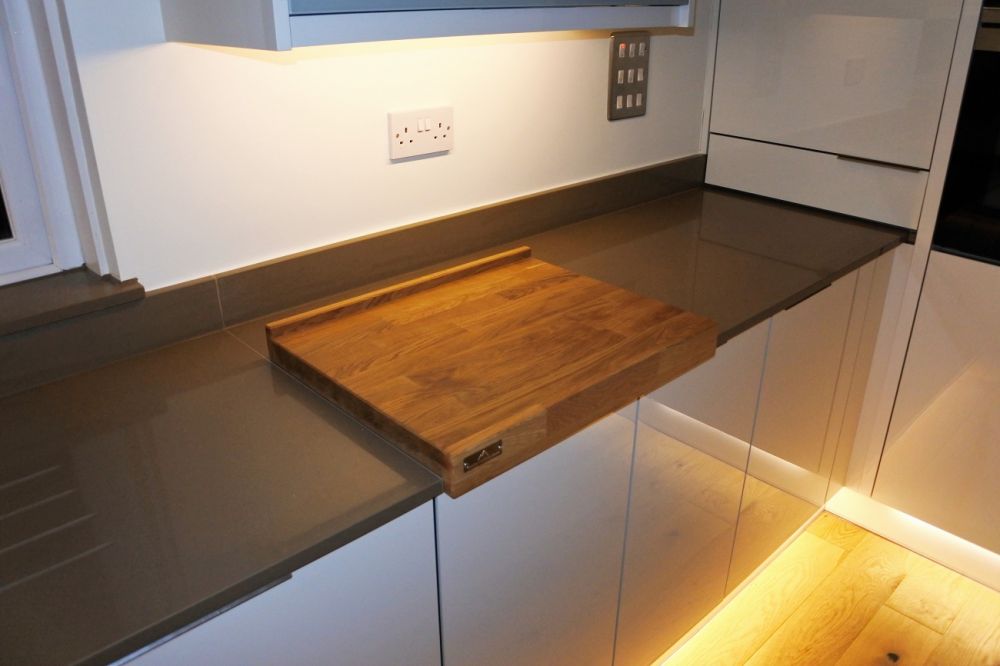 We can make you a stunning Oak reversible chopping board, you must protect that Silestone!