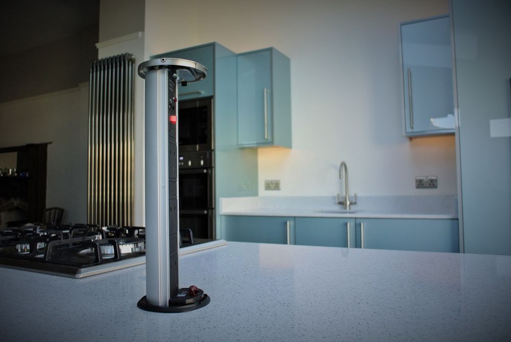 More suited to the modern kitchen application, the pop up power tower. Three 240v plug points and Two USBs for charging smart devices